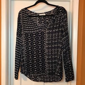 Long sleeve navy blue and white patterned shirt